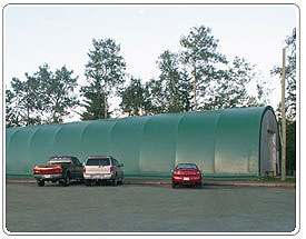 Outside the Steel Truss, Fabric Covered, Building Solution for Golf Cart Storage Building - Milestones Building & Design